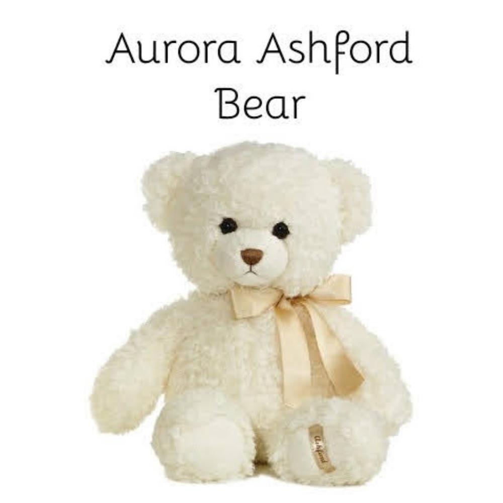 K - Aurora Ashford Bear w foot imprint.